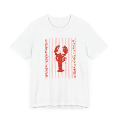 White t-shirt with a red lobster illustration on pink vertical stripes and floral border, hand-drawn by Rebecca Illustrated.