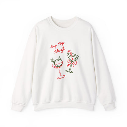 crewneck sweatshirt with ‘Sip Sip Sleigh’ holiday cocktail artwork in red and green, hand illustrated by Rebecca Illustrated
