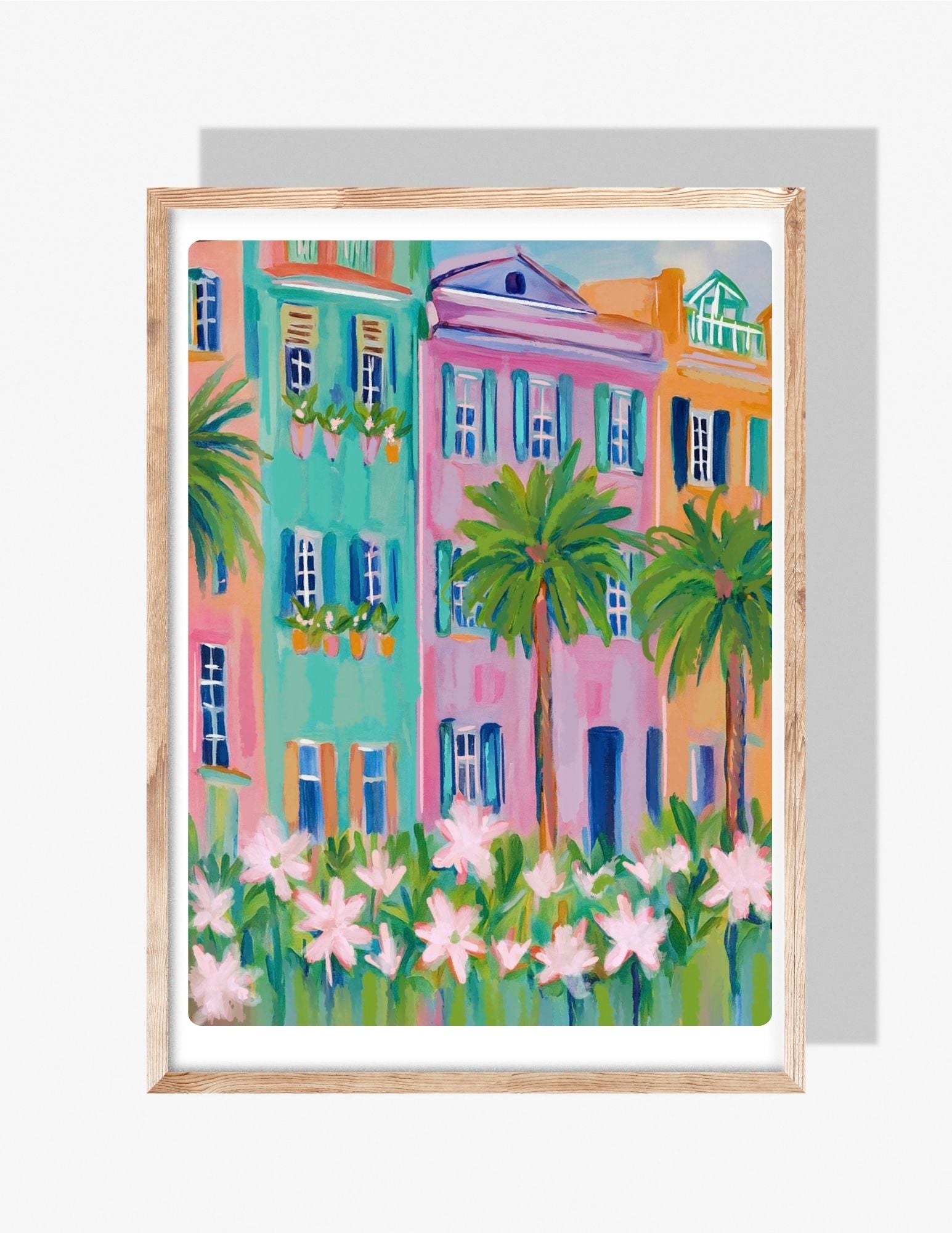 Colorful illustration of Charleston’s Rainbow Row with palm trees and pink flowers — art by Rebecca Illustrated.