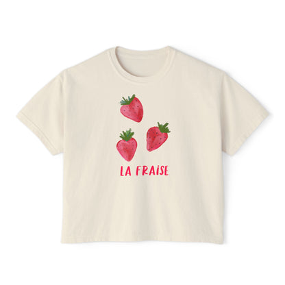 Cream cropped t-shirt featuring three hand-drawn strawberries and the text ‘La Fraise’ in pink lettering, illustrated by Rebecca Illustrated.