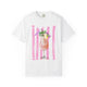 White t-shirt with Rebecca Illustrated watercolor pink tropical cocktail daiquiri artwork featuring umbrella, citrus, flowers, and pink brushstroke background