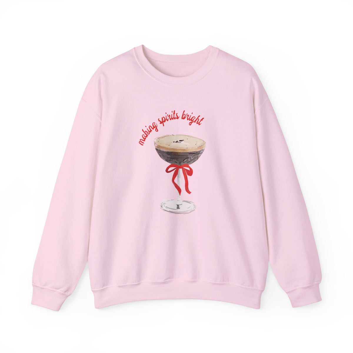 Pink sweatshirt with illustrated espresso martini glass tied with a red bow and text ‘making spirits bright,’ artwork by Rebecca Illustrated