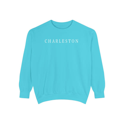 Turquoise Charleston crewneck sweatshirt with white CHARLESTON lettering on front, designed by Rebecca Illustrated.