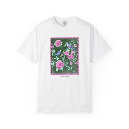 White t-shirt with a floral and bird design on a white background