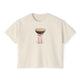 Cream cropped t-shirt featuring a hand-drawn espresso martini glass with a pink ribbon illustration by Rebecca Illustrated.