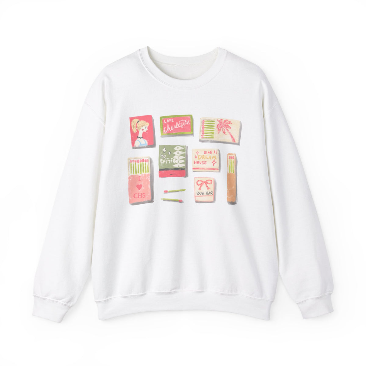 White sweatshirt with illustrated vintage-style matchbooks featuring Charleston themes, restaurants, palm tree, girl illustration, and pastel colors, artwork by Rebecca Illustrated