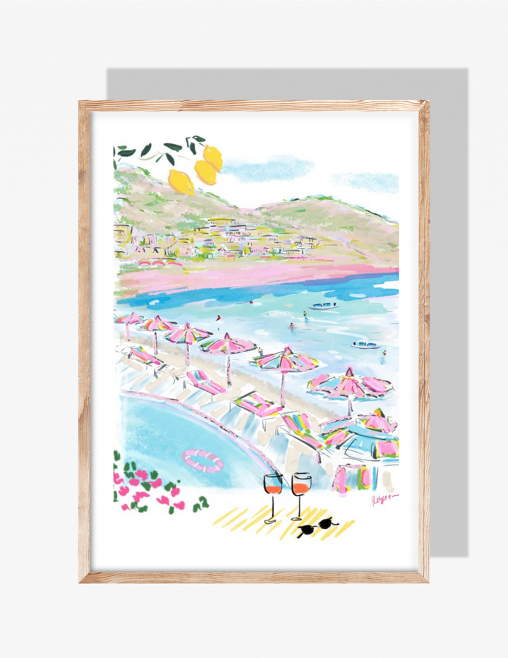 Watercolor-style coastal illustration with colorful beach umbrellas, turquoise water, hillside homes, lemons, glasses of rosé, and swimmers.