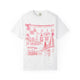 White graphic t-shirt featuring a hand-drawn coral pink illustration of Charleston, South Carolina landmarks including the Ravenel Bridge, historic buildings, church steeples, palm trees, oysters, pineapple, horse-drawn carriage, and Charleston-themed icons.