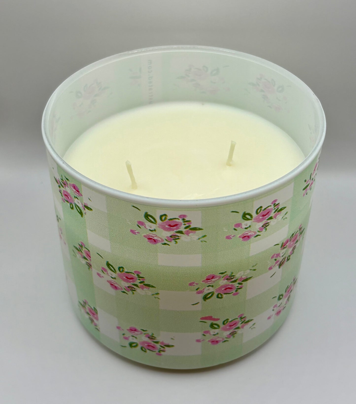 Hand illustrated green floral ceramic candle by Rebecca Illustrated