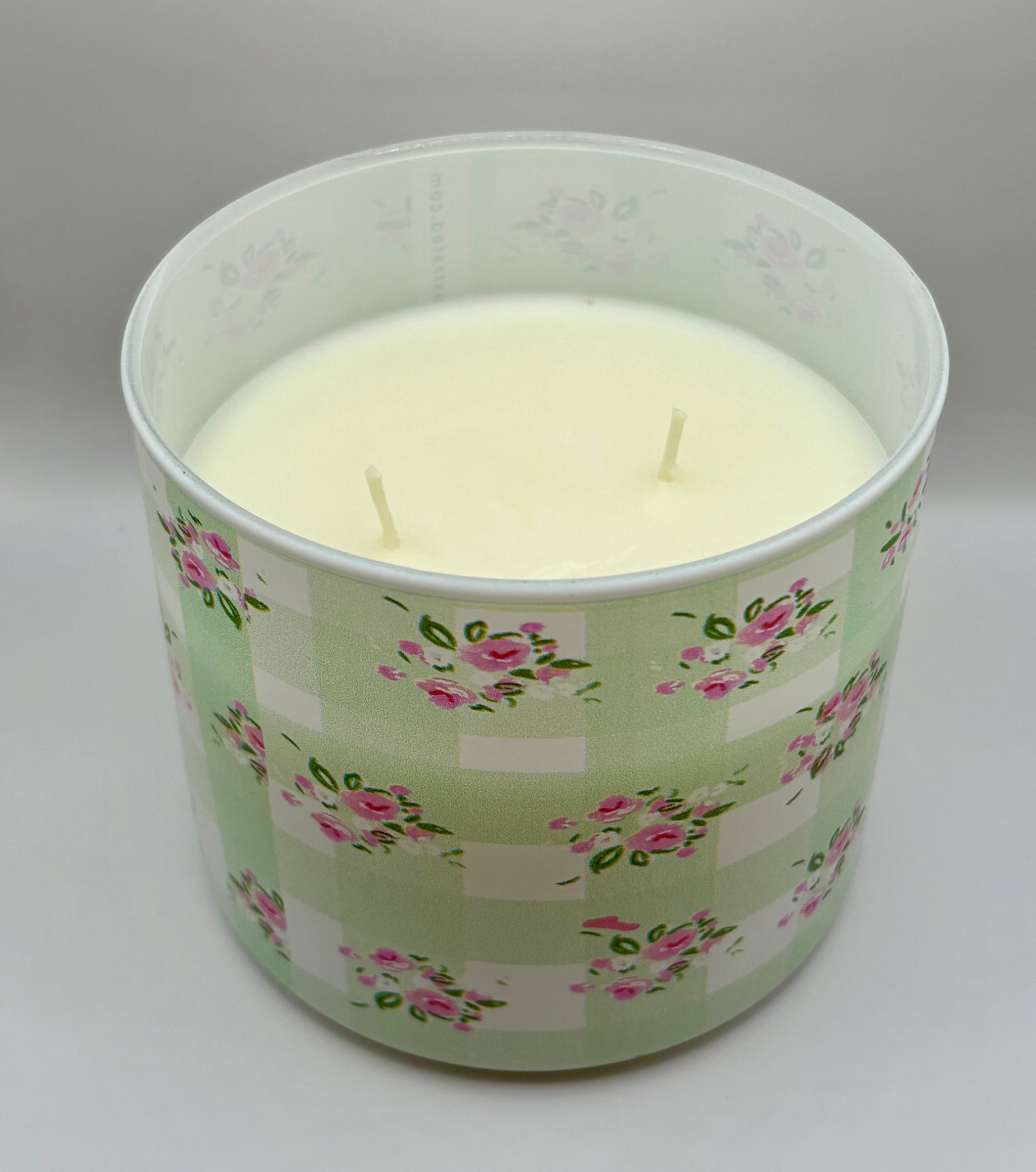Hand illustrated green floral ceramic candle by Rebecca Illustrated