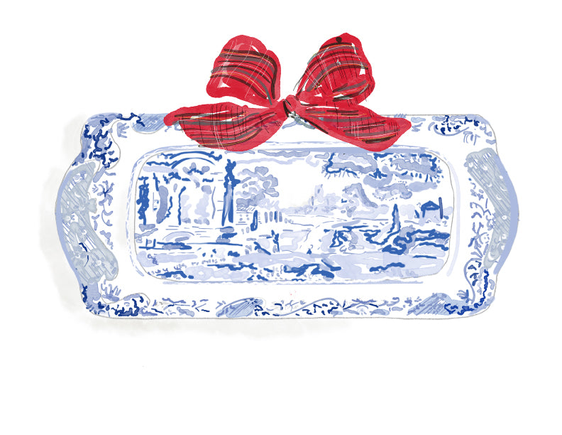 Illustration of a blue and white chinoiserie-style serving plate with a red tartan bow, artwork by Rebecca Illustrated.