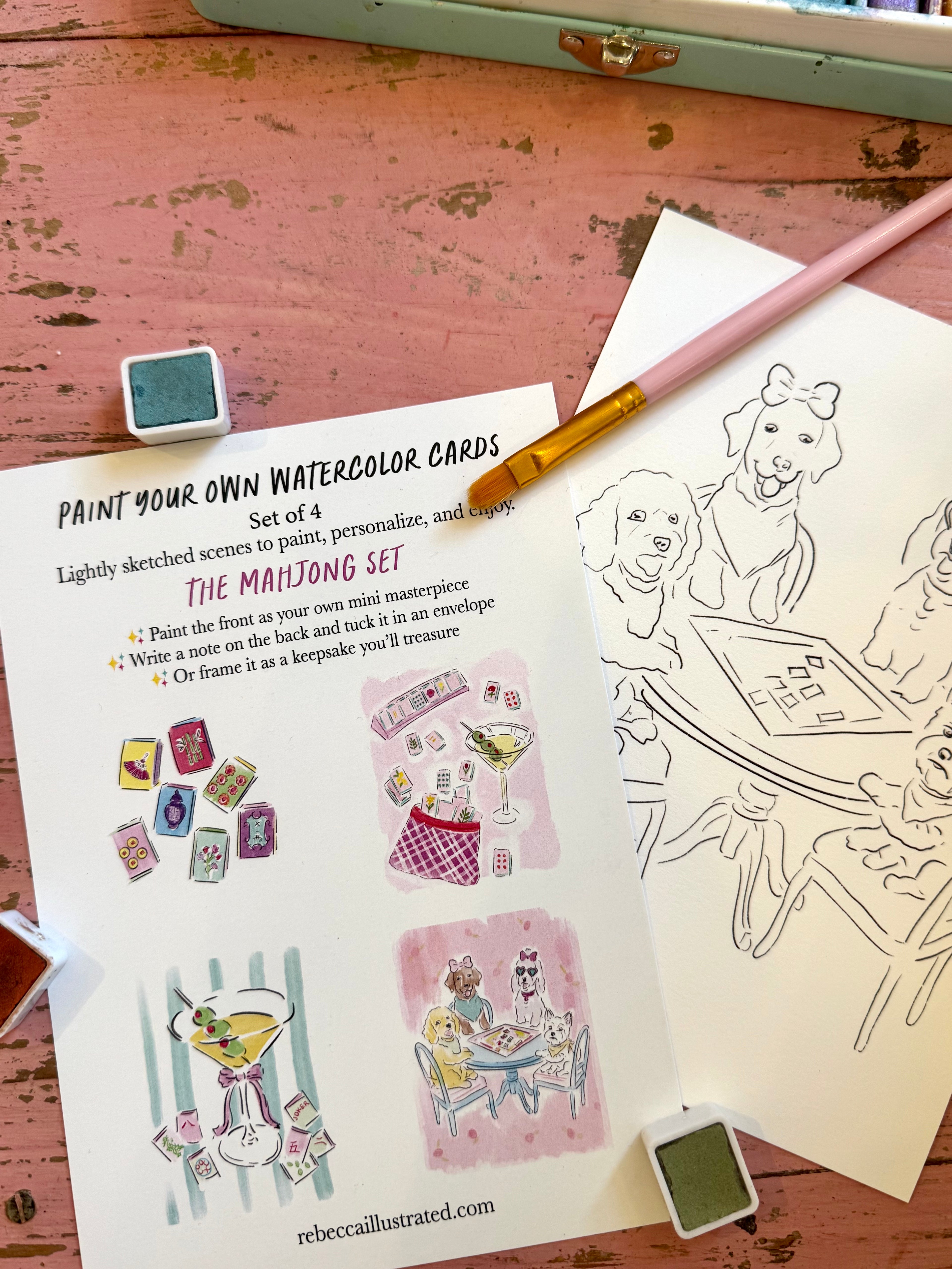 Paint your own watercolor cards set with illustrations and instructions on a wooden surface.