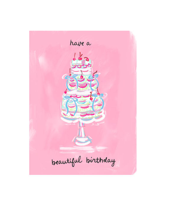 Illustrated birthday greeting card featuring a tiered cake on a stand with colorful frosting details on a pink background and “Have a beautiful birthday” text, by Rebecca Illustrated.