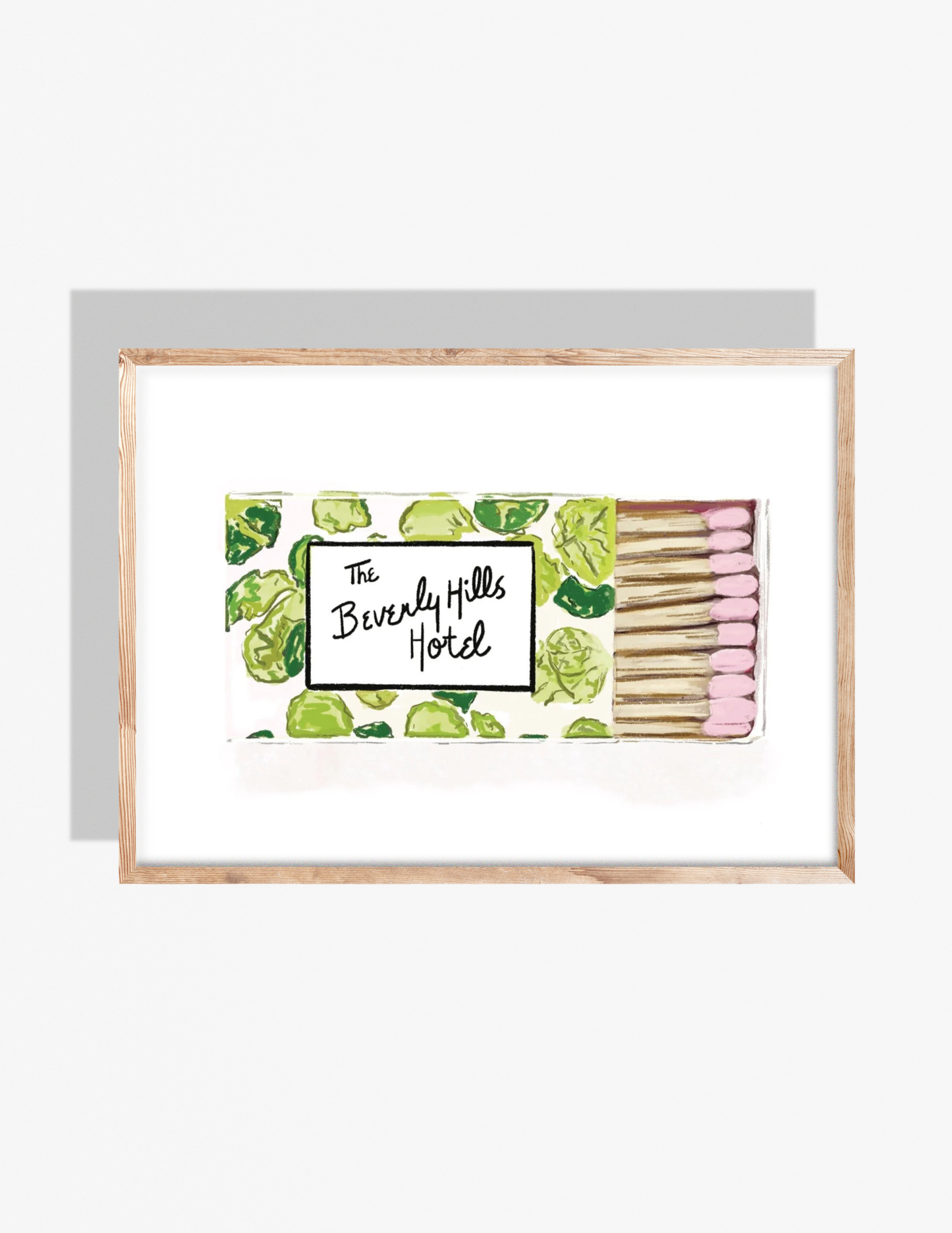 Illustration of a Beverly Hills Hotel matchbook with green palm leaf pattern and pink match tips by Rebecca Illustrated.