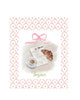 Illustrated greeting card with a Parisian café scene featuring a croissant, espresso, newspaper, pink patterned border, and the word “bonjour,” by Rebecca Illustrated.