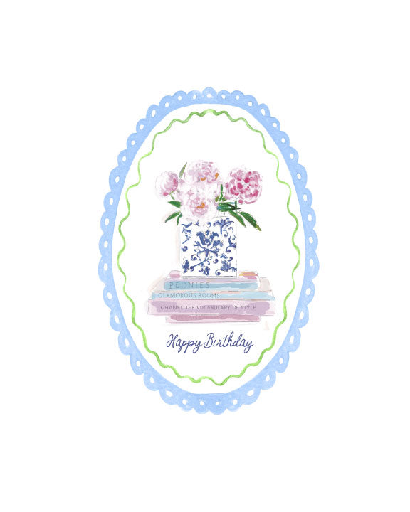 Illustrated birthday greeting card featuring pink peonies in a blue-and-white vase atop stacked books, framed by a scalloped border, by Rebecca Illustrated.