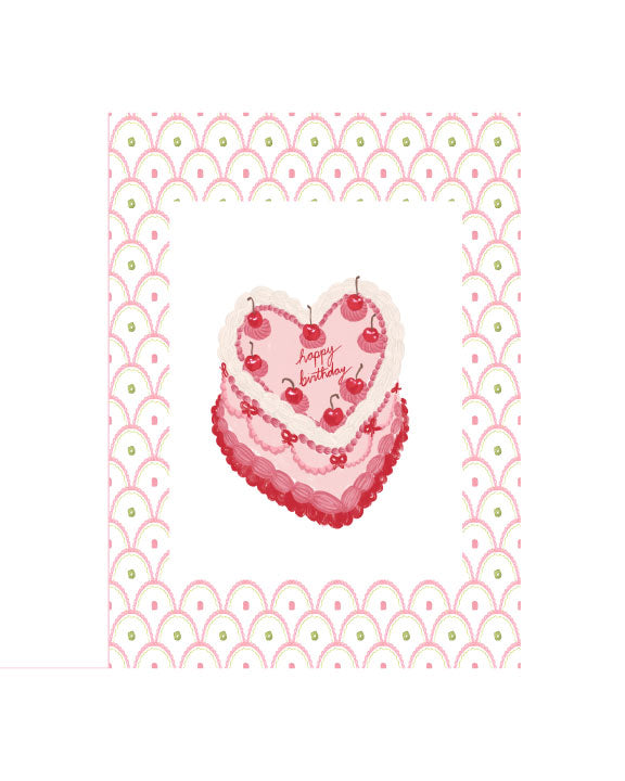 Illustrated birthday greeting card featuring a heart-shaped cherry cake with pink frosting and a decorative pink patterned border, by Rebecca Illustrated.