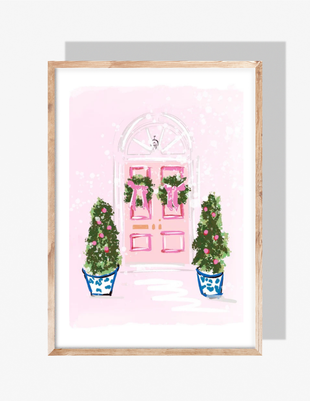 Pink front door decorated with Christmas wreaths and two festive topiary trees in blue-and-white chinoiserie pots, illustrated by artist Rebecca Illustrated.