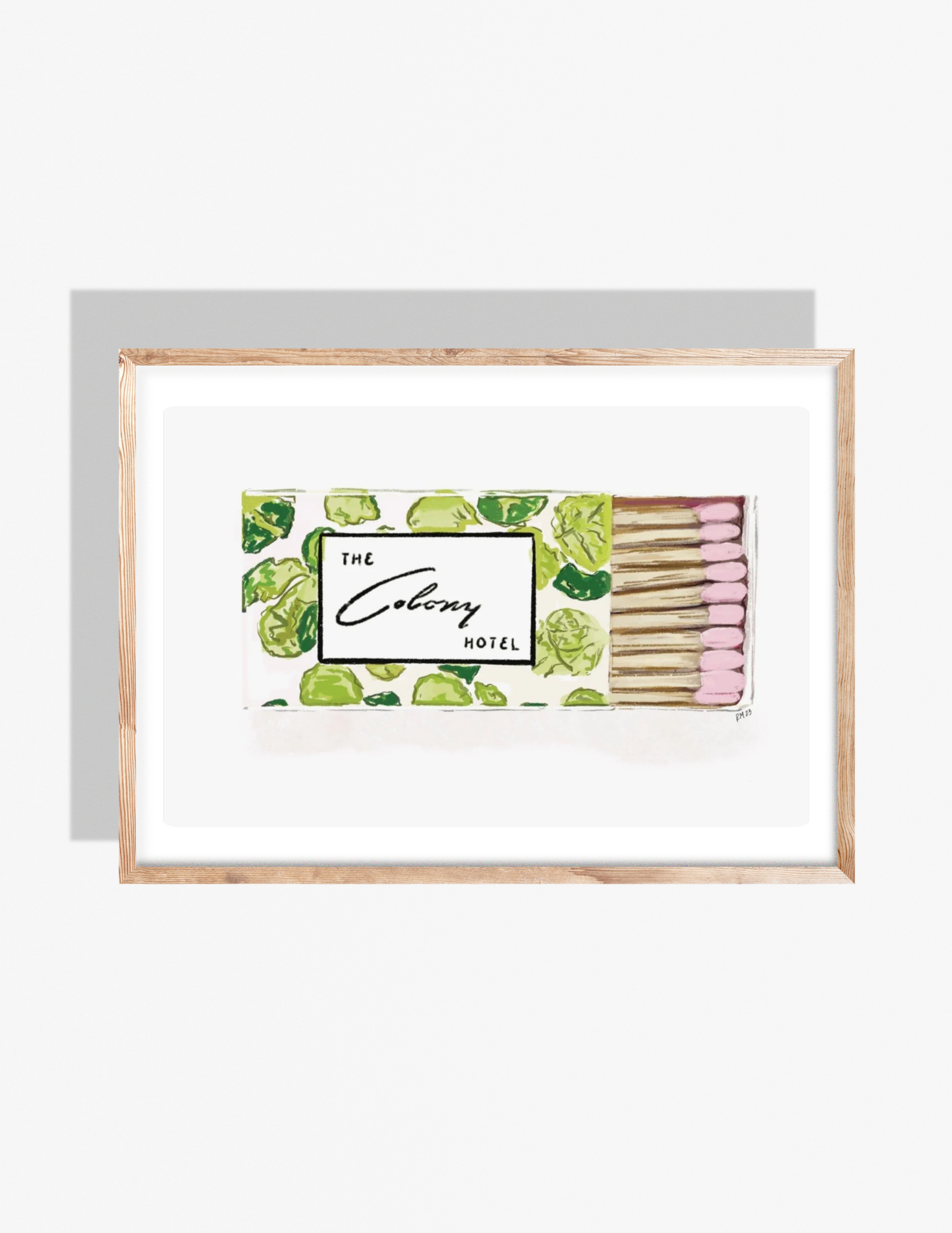 Illustration of a Colony Hotel matchbox with green patterned design and pink match tips, artwork by Rebecca Illustrated.