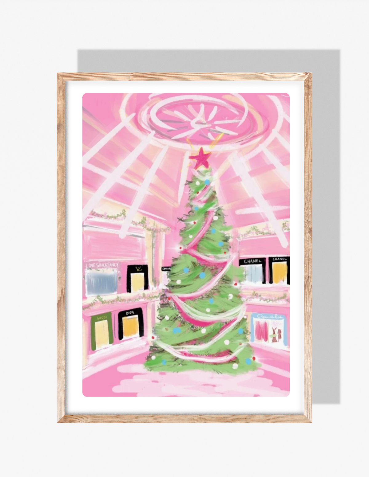 A vibrant pink Christmas illustration by Rebecca Illustrated featuring a large decorated tree inside a luxury mall surrounded by designer storefronts and festive garlands.