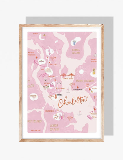 Pink illustrated map of Charleston, South Carolina featuring neighborhoods, landmarks, and coastal icons by artist Rebecca Illustrated.