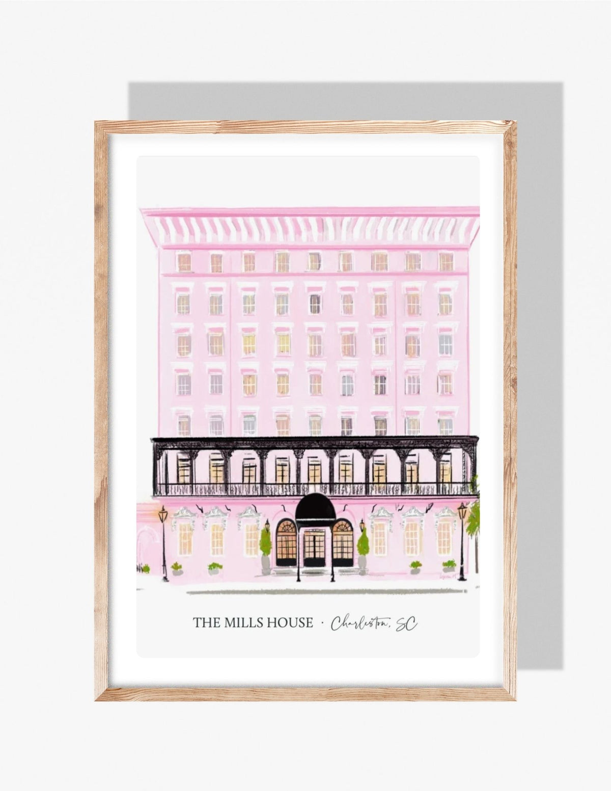 Illustration of The Mills House Hotel in Charleston, SC, painted in soft pink with black iron balconies — art by Rebecca Illustrated.