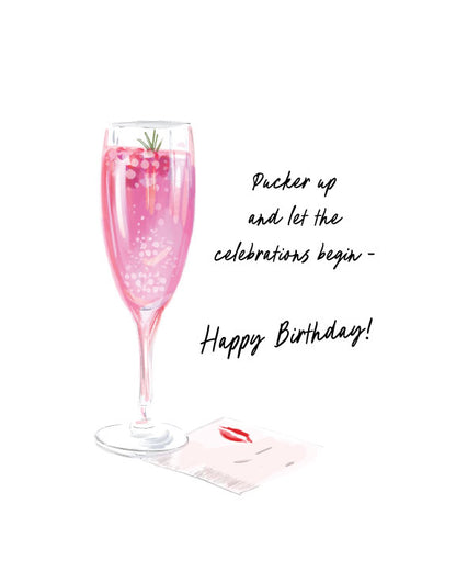 Illustrated champagne birthday greeting card featuring a pink cocktail with the text “Pucker up and let the celebrations begin – Happy Birthday!” by Rebecca Illustrated