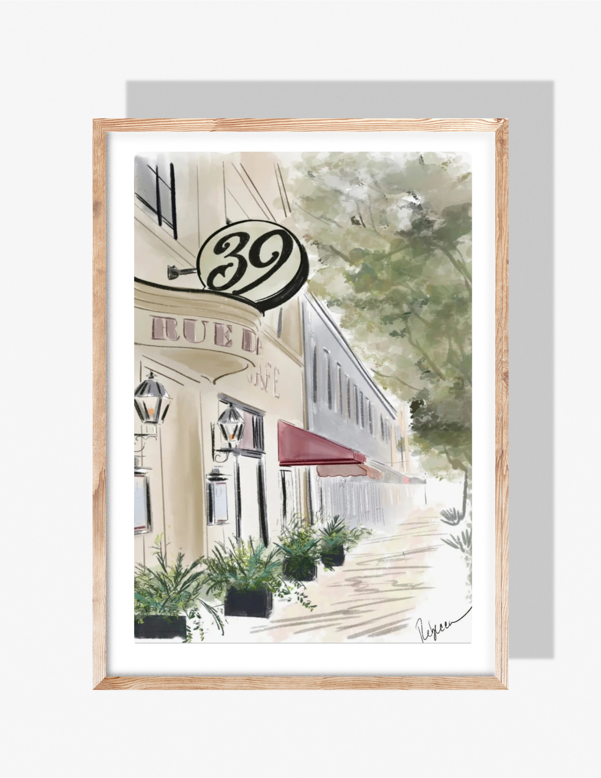 A pastel illustration by Rebecca Illustrated depicting a charming Parisian café with striped awnings, greenery, lanterns, and a romantic street view.