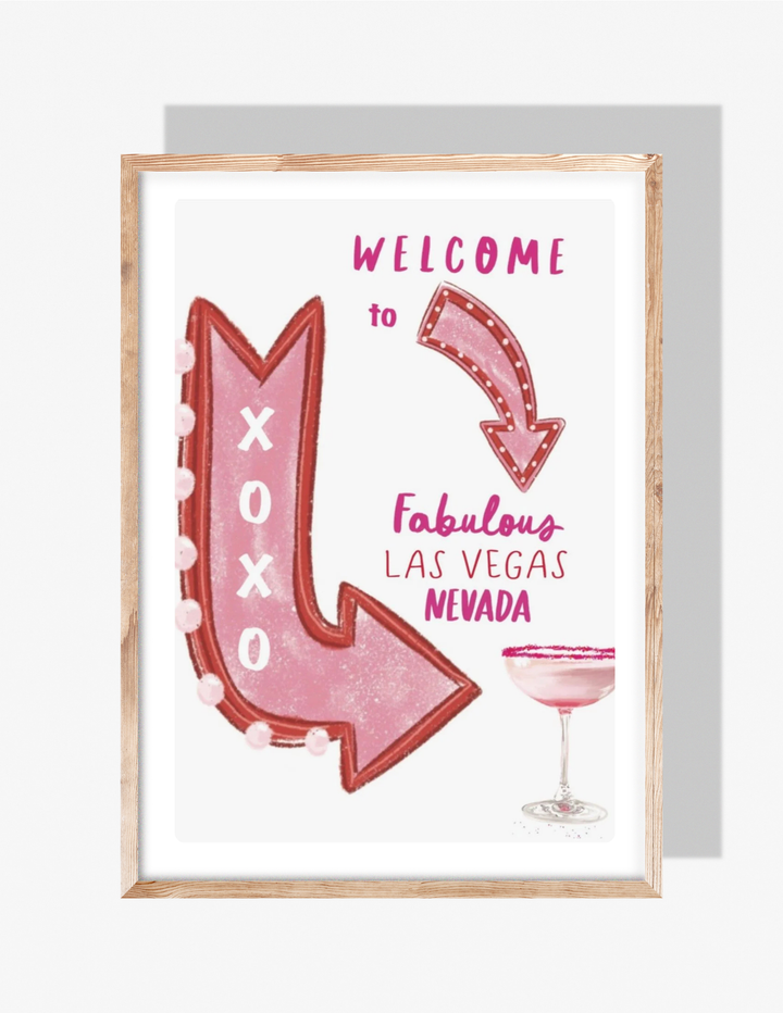 Pink Vegas-themed illustration with arrow signs, ‘Welcome to Fabulous Las Vegas Nevada’ text, and a pink cocktail.