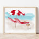 Illustration of two red lounge chairs under a red-and-white umbrella on a sandy beach with ocean waves — artwork by Rebecca Illustrated
