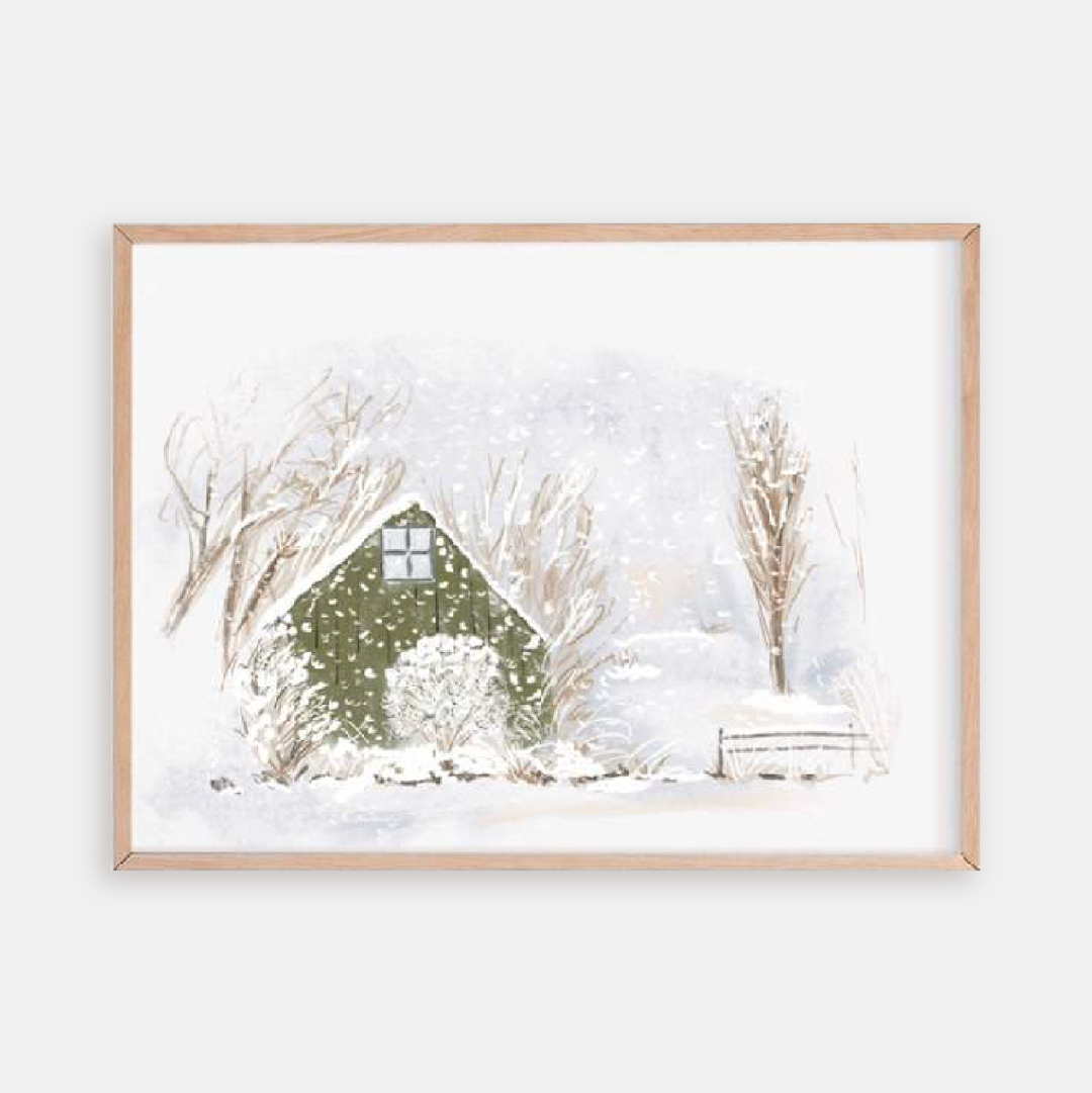Illustration of a green cabin in a snowy winter landscape with trees, falling snow, and a bench.