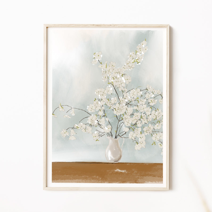 Illustration of white blossoms arranged in a vase on a tabletop with a soft blue background — artwork by Rebecca Illustrated